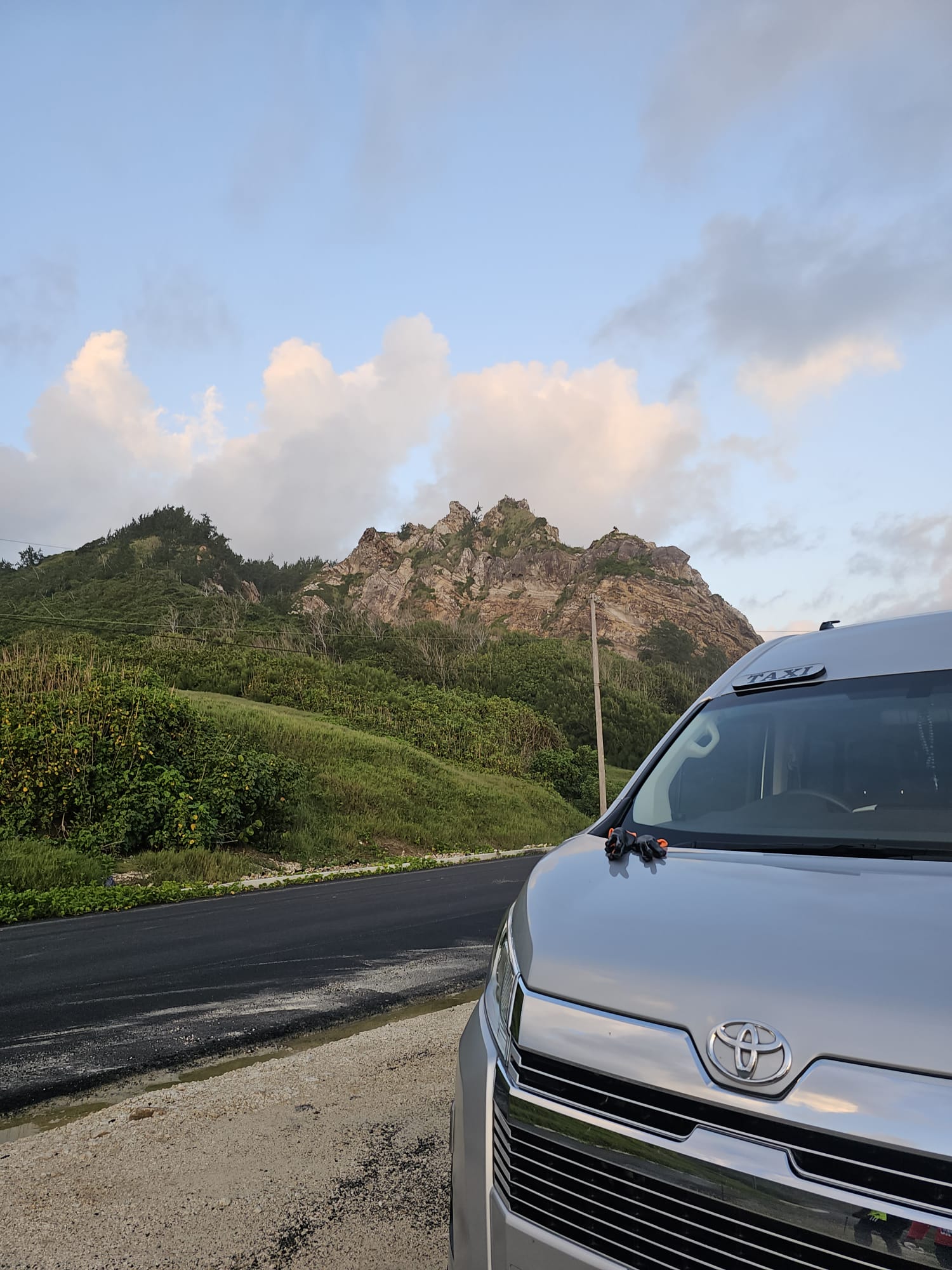 Toyota luxury van on a Barbados east coast hill road