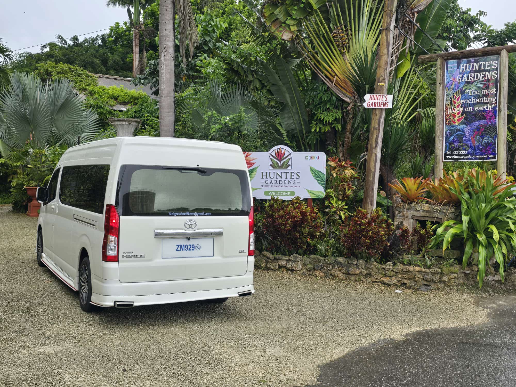 White luxury van at Hunte's Gardens on a Barbados island tour